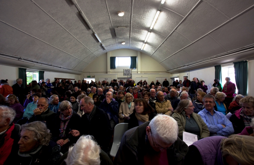 The packed public meeting