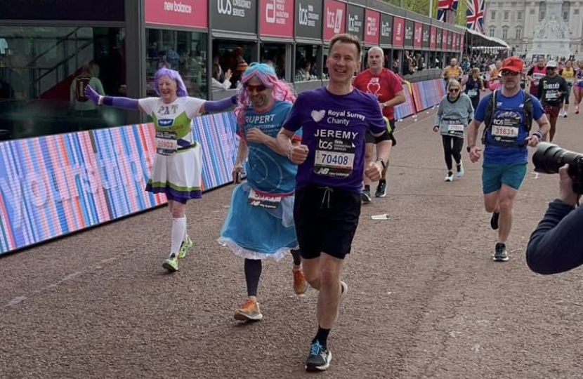 Jeremy Hunt crossing the London Marathon finish line.