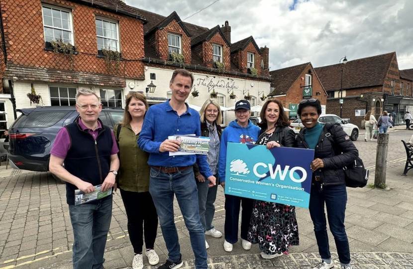 Jeremy Hunt MP canvassing with team. 